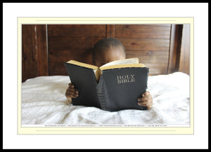 08.01.01.15.B — People — Child Reading the Bible — SoloPhoto™